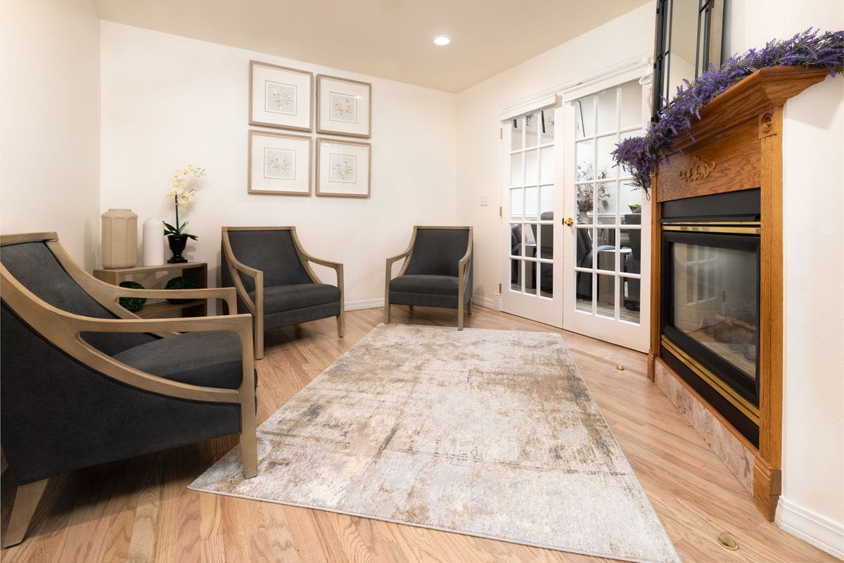 Cozy living room at Ideal Care Homes Bellevue senior care facility